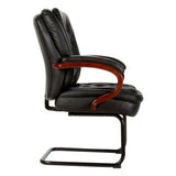 Bentley visitors chair in black bonded leather, with solid wooden arms, soft padding and a black powder-coated sleigh base frame. The image is a side view of the chair.