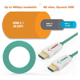 HDMI 8K Fibre 2.1 Cable 50 Metres, Image Showing a Green HDMI Fibre Optic Cable and Two HDMI Connectors for High-Speed 8K Video Transmission and Dynamic Hdr.